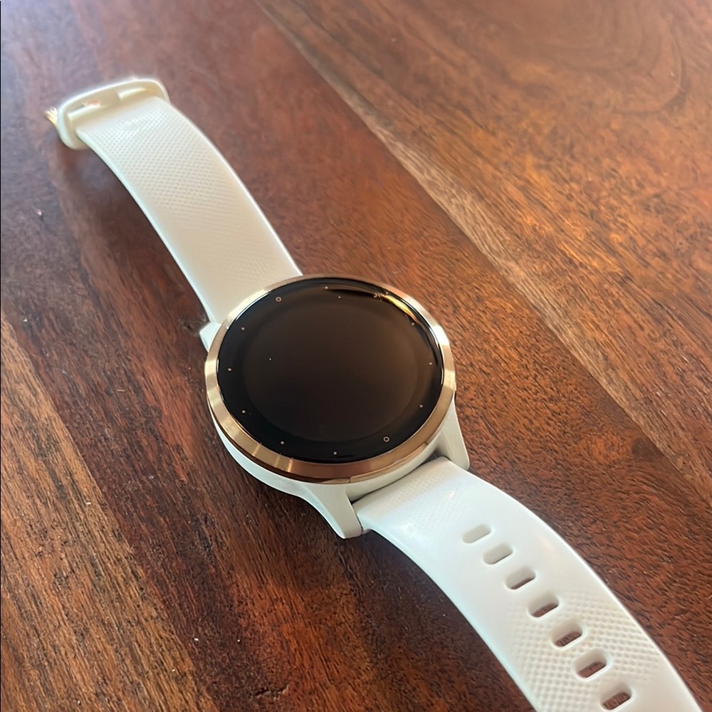 Garmin Vivoactive 4s Smartwatch with White Band and Silver Bezel